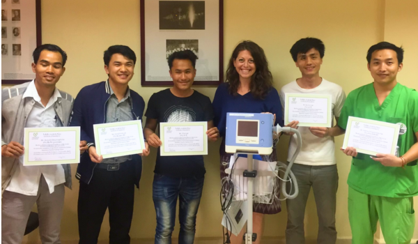 Four nurses holding certificates and standing with CGN Director, Rebecca Silvers